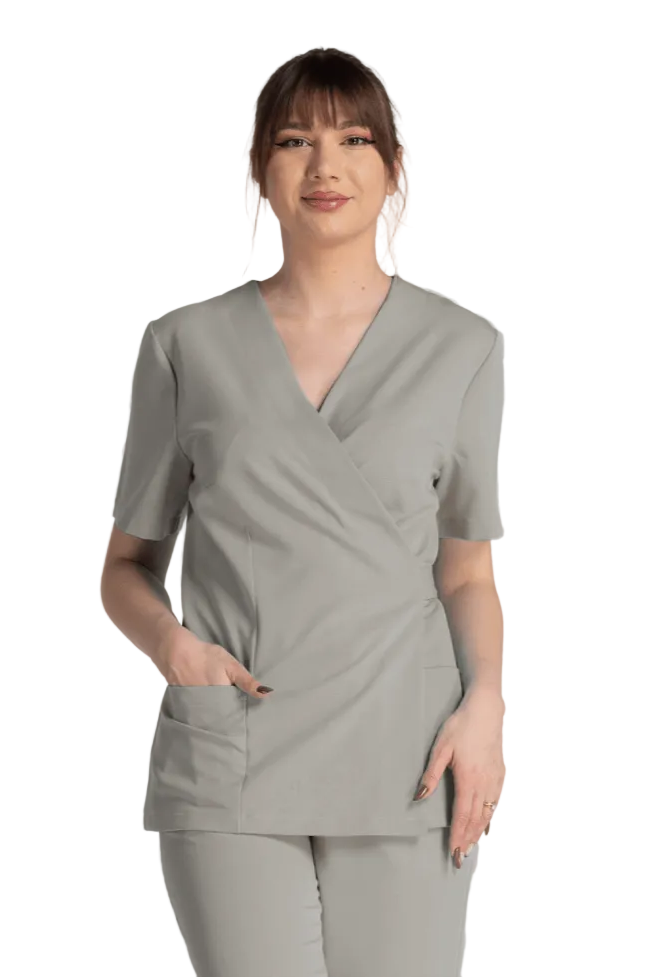 Bluza Elastica Bianca, bluză cu design ergonomic, două buzunare, ajustare talie, material elastic superior.