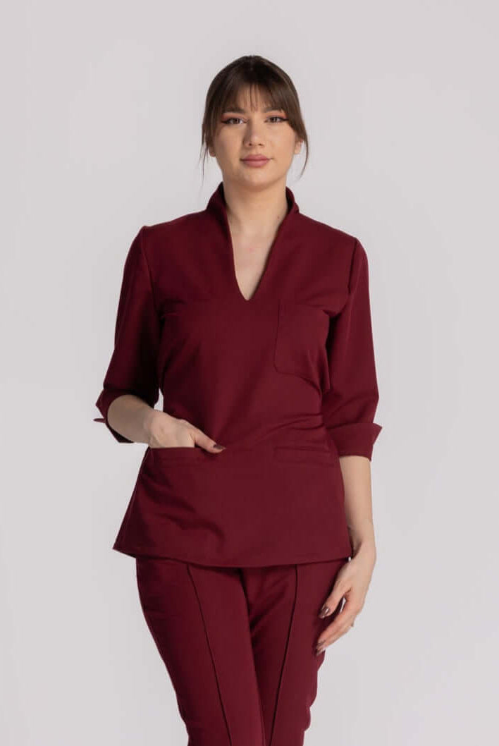 Bluza Elastica Elise - uniforma medicala eleganta cu guler shal si bucle ajustabile, perfect pentru profesionisti.