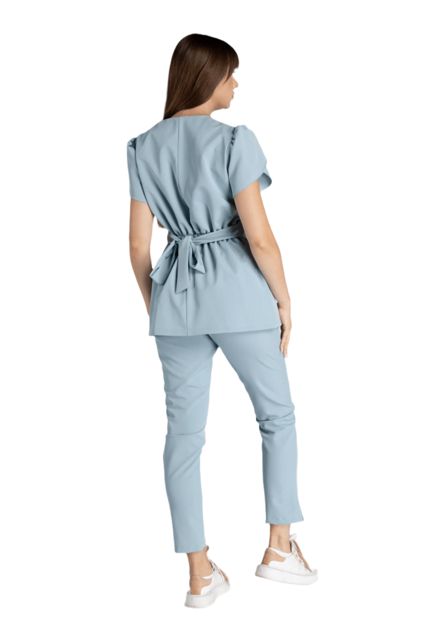 Costum Premium Elastic Sofia în azul, cu design elegant și confortabil, purtat de o femeie din spate.