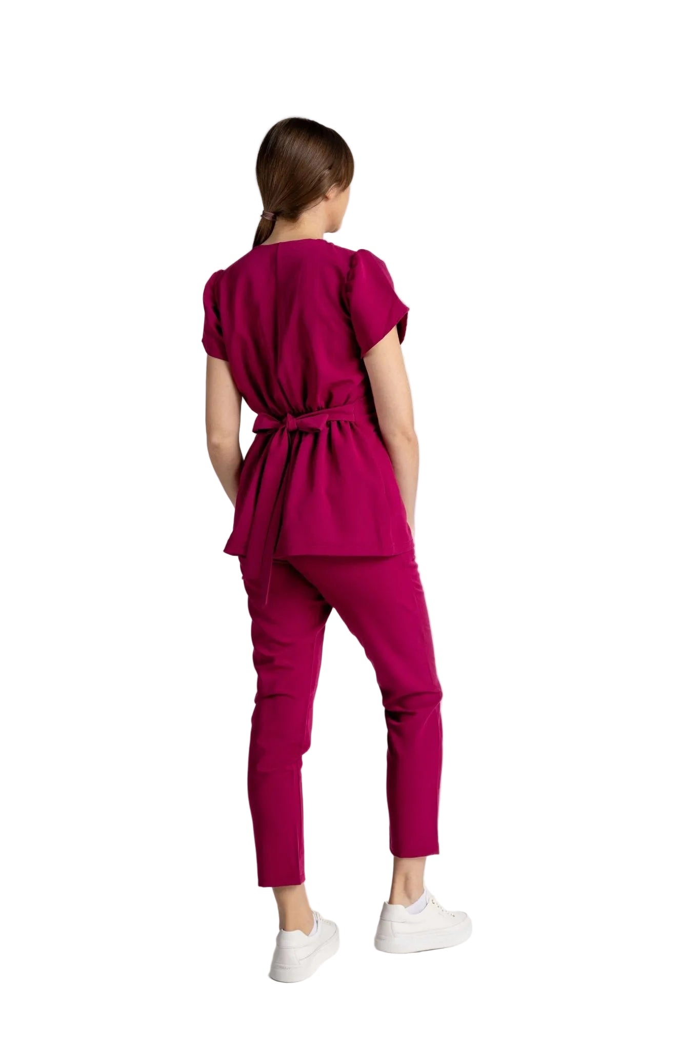 Costum Premium Elastic Sofia în nuanță de fucsia, cu mâneci lalea și detalii elegante, din spate.